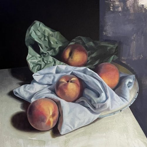 Peaches with green paper